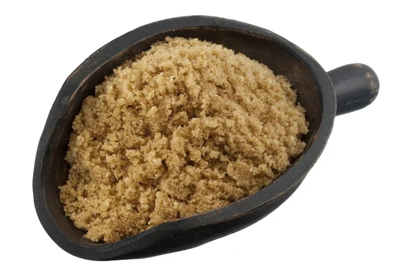 Scoop of brown cane sugar — Stock Photo, Image