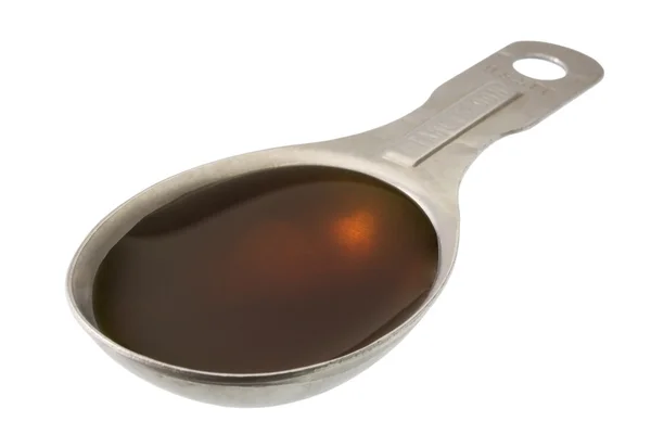 Colher de sopa de xarope de bordo — Fotografia de Stock