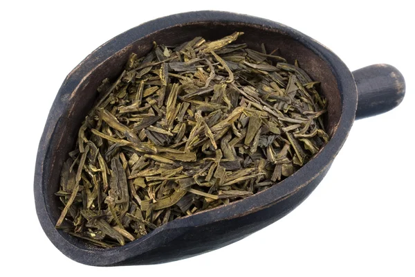 Schöpflöffel voll Blattloser grüner Tee — Stockfoto