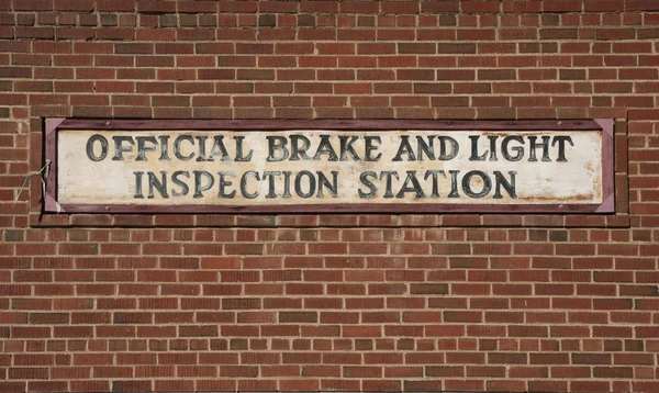 Vintage brake and light inspection sign — Stock Photo, Image