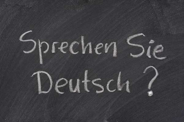 Você fala alemão pergunta em um quadro-negro — Fotografia de Stock