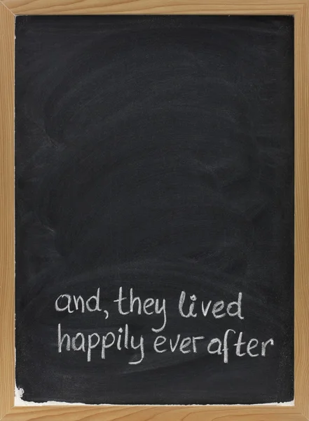 Fairytale happy end phrase on blackboard — Stock Photo, Image