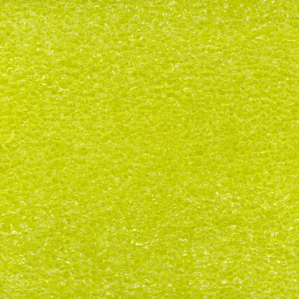 Textura de espuma de plástico amarelo — Fotografia de Stock