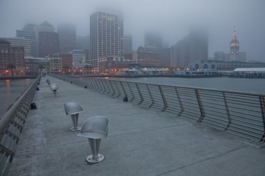 San Francisco skyline on a foggy morning clipart