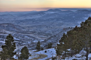 Winter dusk at Colorado Rocky Mountains clipart