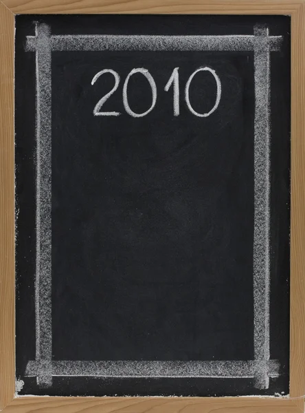 2010 - bílé křídy na tabuli — Stock fotografie