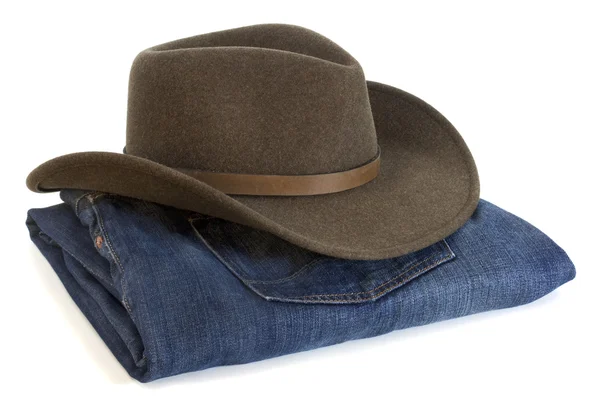 Chapéu de cowboy e jeans azuis — Fotografia de Stock