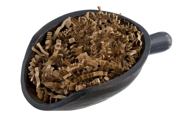 Scoop of brown shredded paper — Stock Photo, Image