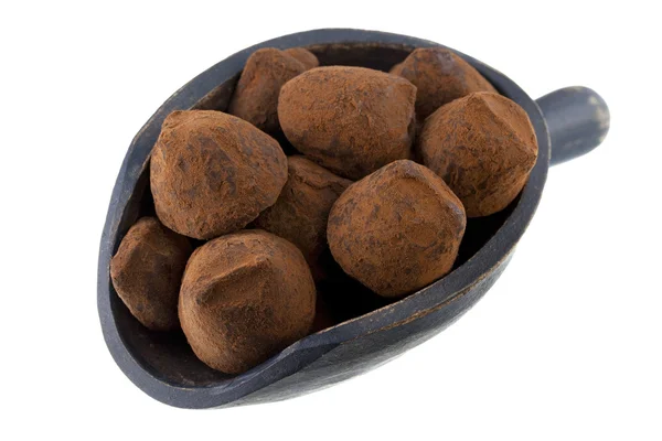 Scoop of chocolate truffles — Stock Photo, Image