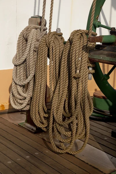 Coiled ropes and winch — Stock Photo, Image
