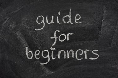 Guide for beginners title on a blackboard clipart