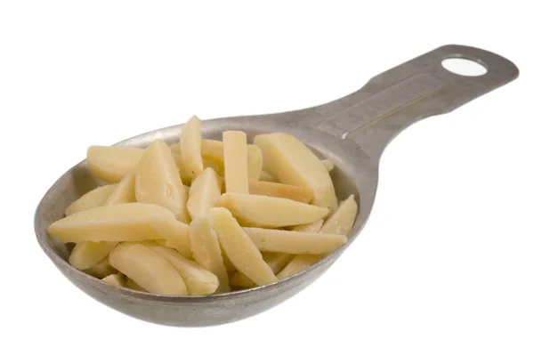 Medição colher de sopa de amêndoas cortadas — Fotografia de Stock