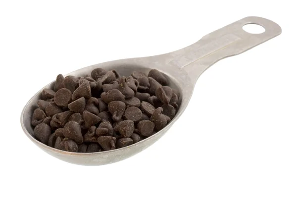 Tablespoon of chocolate morsels — Stock Photo, Image