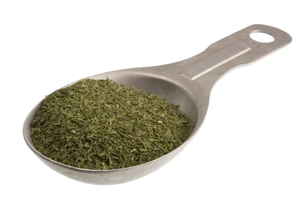 Tablespoon of dried dill weed — Stok fotoğraf