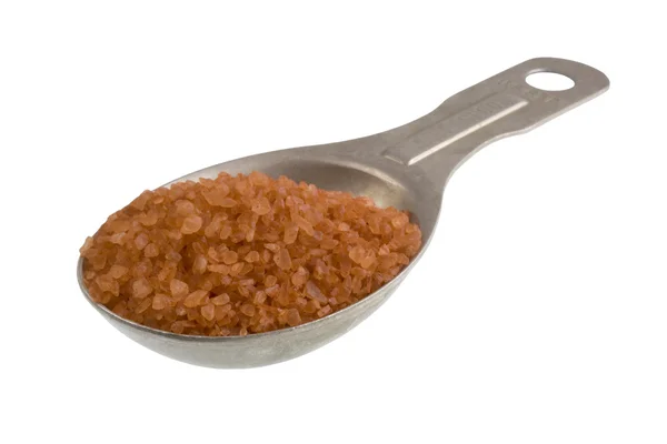 Tablespoon of alaea sea salt — Stock Photo, Image