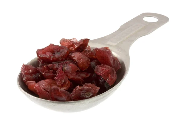 汤匙的红莓干 — 图库照片