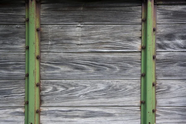 Hout en metalen achtergrond van oude boerderij machiner — Stockfoto