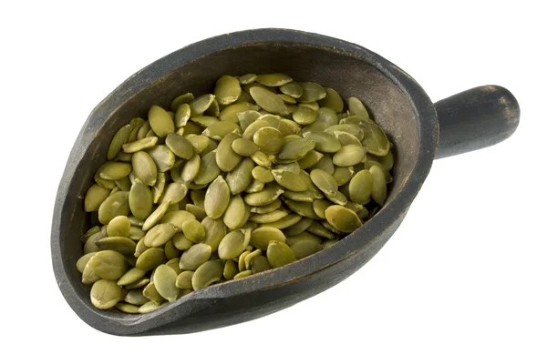 Paleta de pepitas - semillas de calabaza asadas —  Fotos de Stock