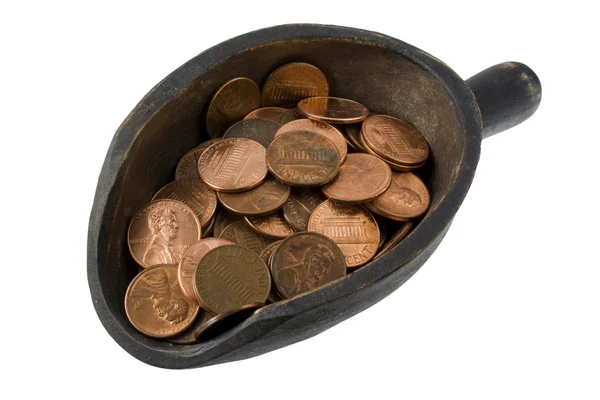 Scoop of pennies - money concept — Stock Photo, Image