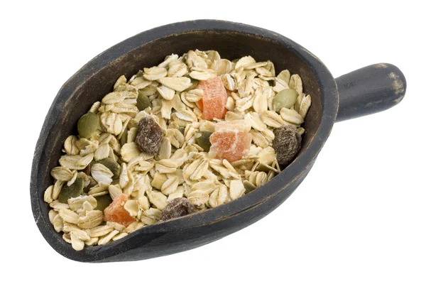 Scoop of muesli cereal — Stock Photo, Image