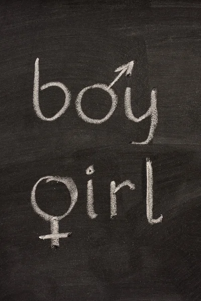 Jongen en meisje woorden met gender symbolen — Stockfoto