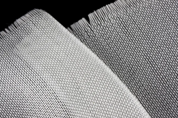 Tkaniny z włókna szklanego na czarny backround — Zdjęcie stockowe