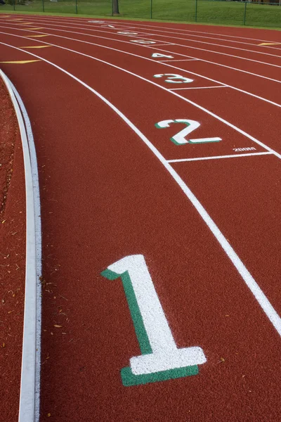 Running tracks met lane nummers — Stockfoto