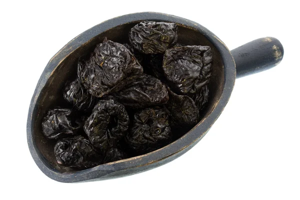 Scoop of dried prunes — Stock Photo, Image