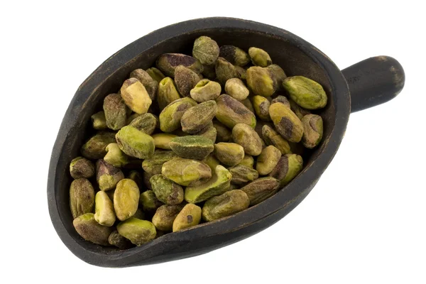 Szufelka z surowego łuskane orzechy pistacjowe — Zdjęcie stockowe
