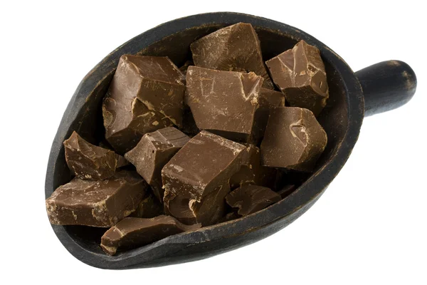 Cucharada de trozos de chocolate con leche —  Fotos de Stock