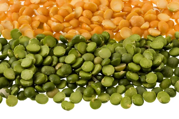 Green and yellow split peas — Stock Photo, Image