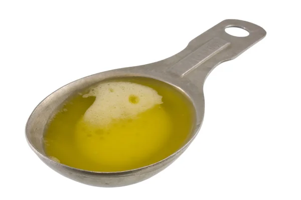 Colher de sopa de manteiga derretida — Fotografia de Stock