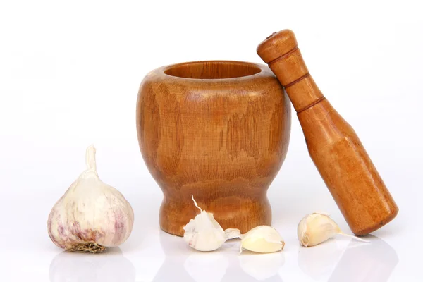 Garlic mortar and pestle Stock Photo