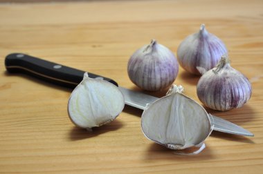 Elephant Garlic on cutting board clipart