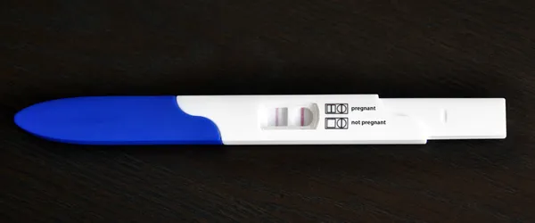 Положительный тест на беременность - English — стоковое фото