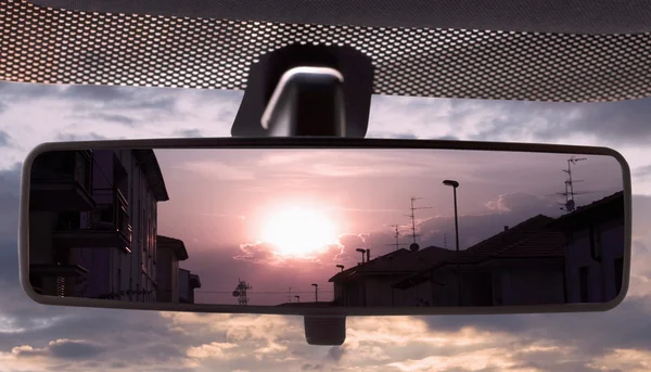 Sunset in the rearviewmirror — Stock Photo, Image