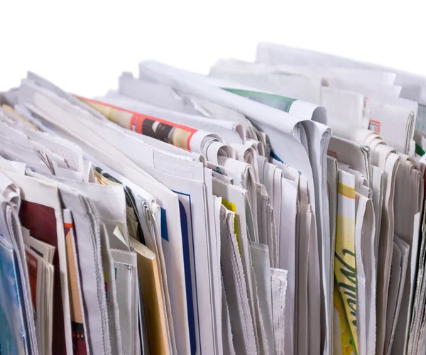 Vertical pile of newspapers and flyers — Stock Photo, Image