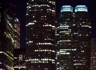 Skyscrapers at night time clipart