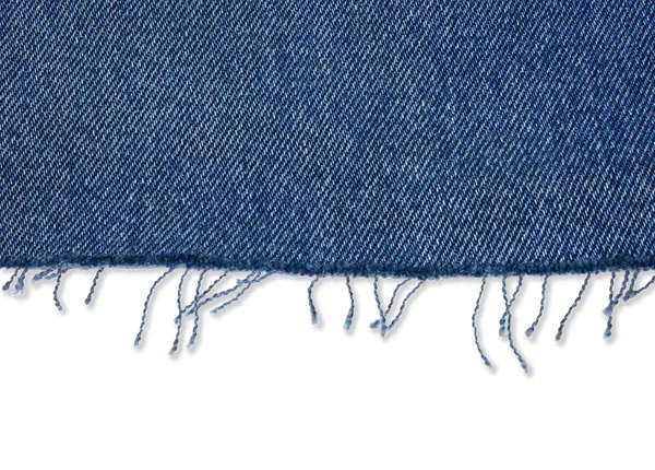Stuk van jeans stof met rand Stockafbeelding