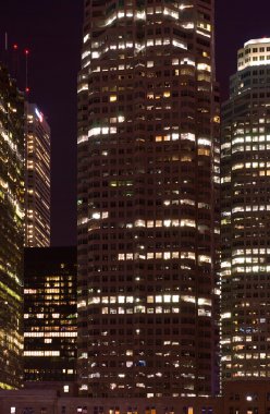 Skyscrapers at night - urban landscape clipart