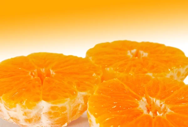 Three half mandarins without peel — Stock Photo, Image