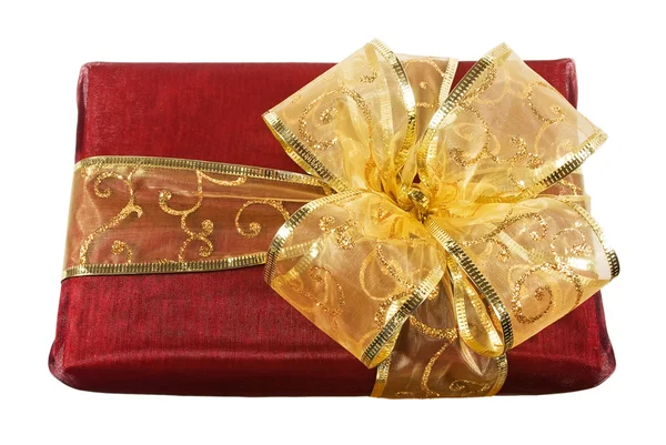 Caja de regalo envuelta en rojo con un lazo — Foto de Stock