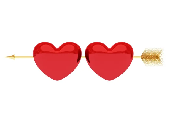 Två hjärtan på det gyllene pil — Stockfoto