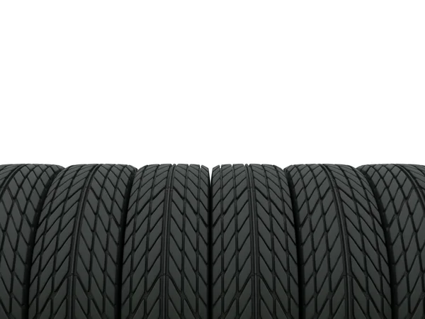Lote de pneus isolados em branco — Fotografia de Stock
