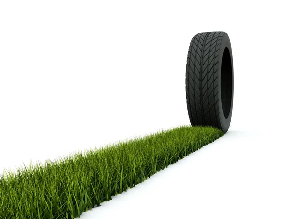 Tire with track from grass isolated on w — Stock Photo, Image