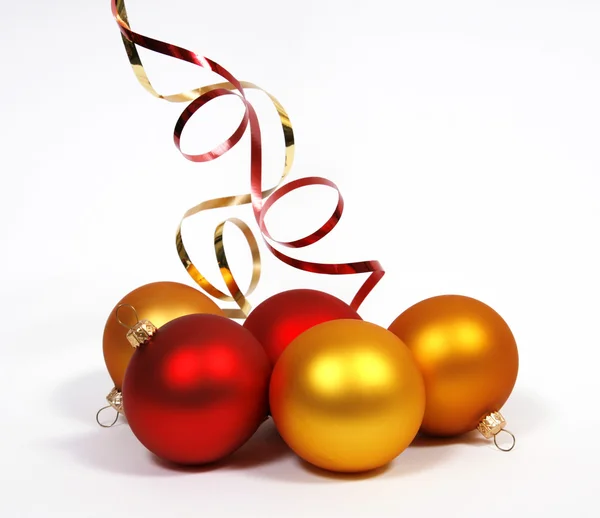 Yellow and red baubles — Stock Photo, Image