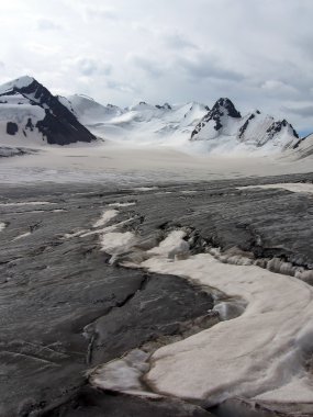 Danger split on the glacier in mountains clipart