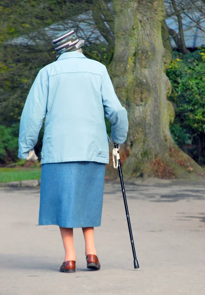 Elderly lady in park — Stock Photo, Image