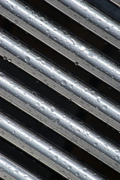 Gotas de chuva na tubulação — Fotografia de Stock