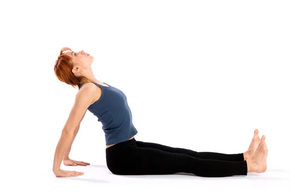 Kvinnan gör tillbaka stretching motion — Stockfoto